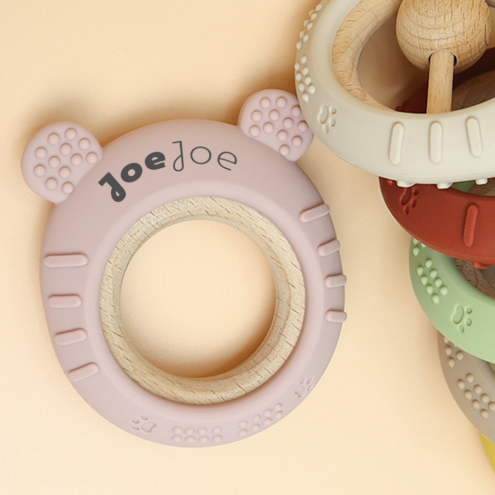 Moon teether — cool to the touch, soft on emerging gums
